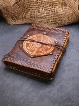 antique leather book - compass