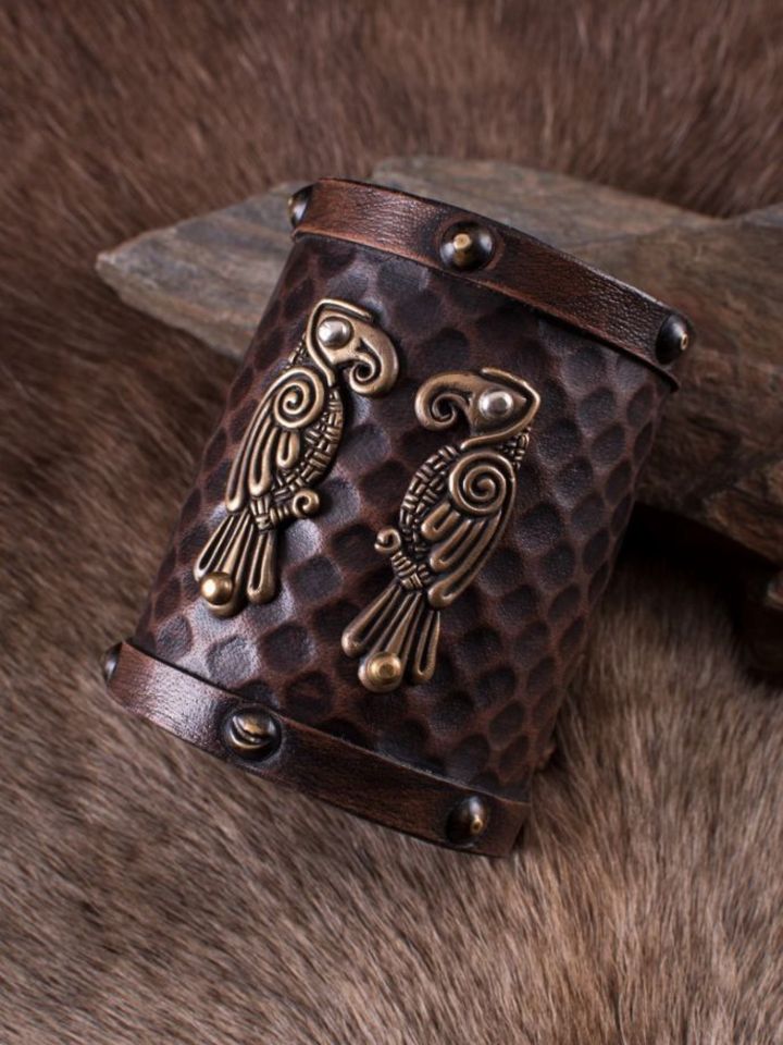 Leather bracers with Hugin and Munin
