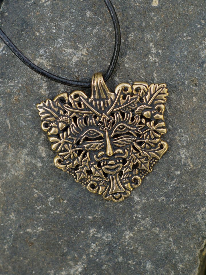 Large bronze green man pendant