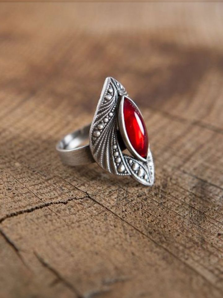 Ring with red gemstone