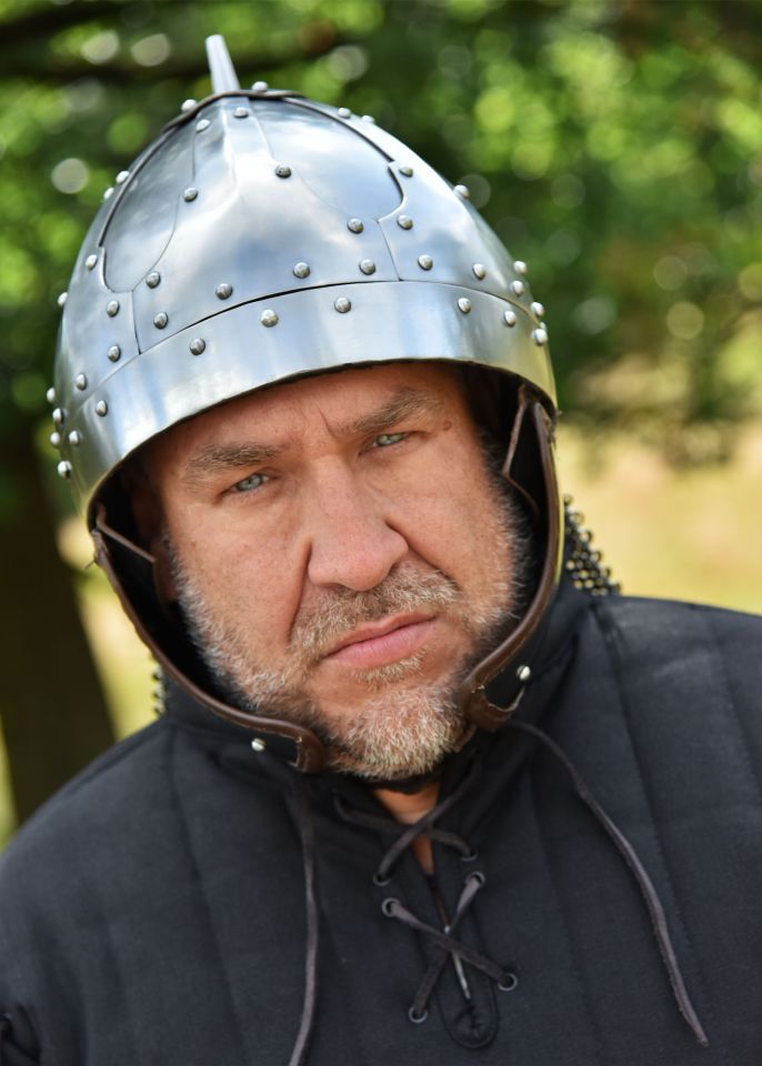 Rivited plate helmet with cheek flap 2