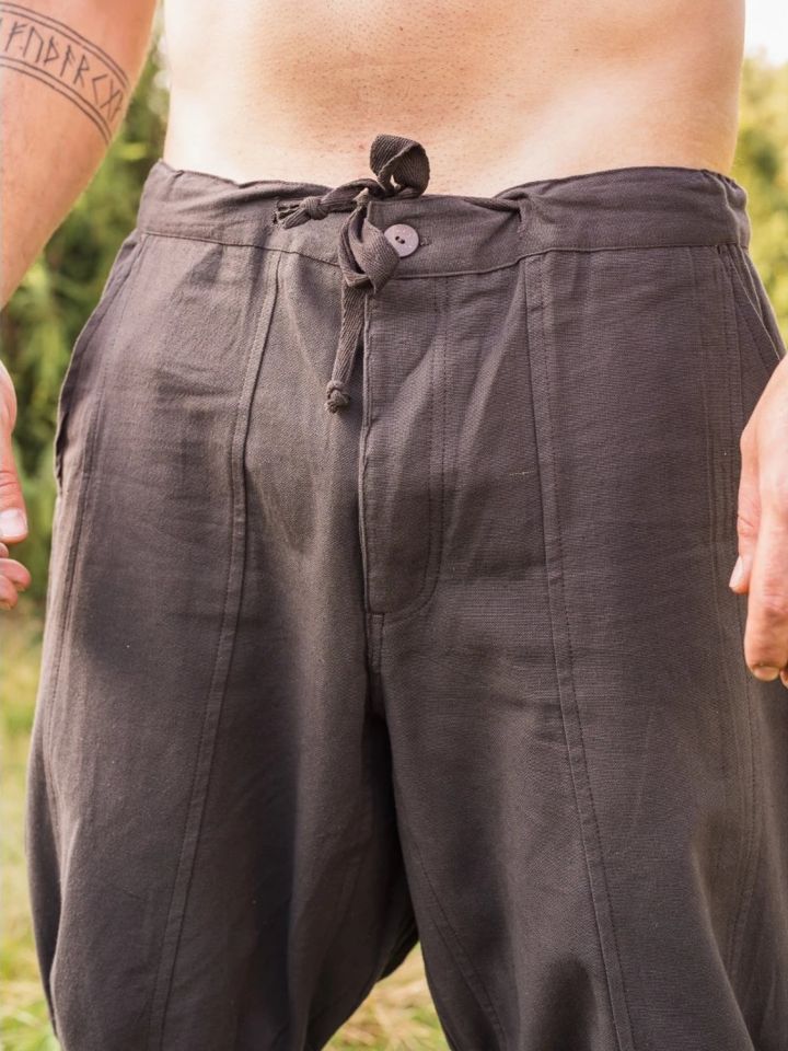 Brown trousers with leg lacing 4